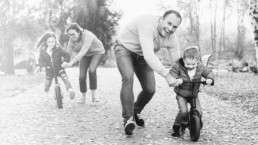 Man and woman playing with kids